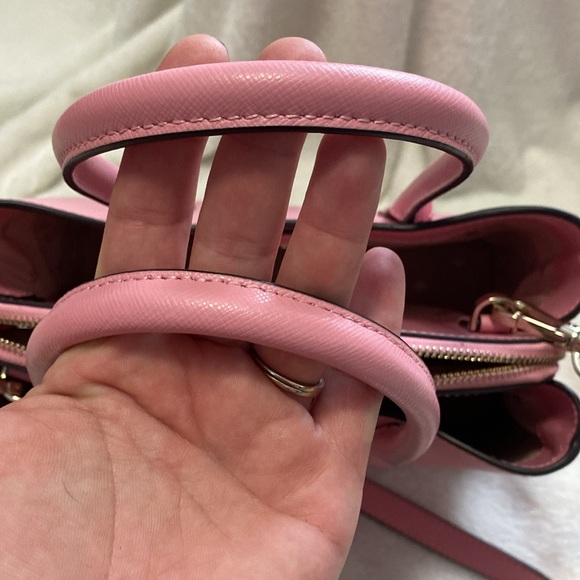 Kate Spade Light Pink Purse can be used as a crossbody or carried by the handles - Picture 10 of 10